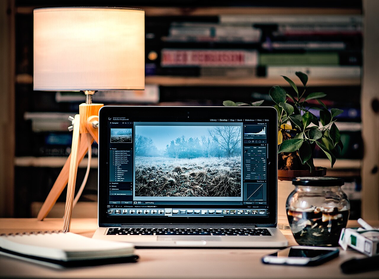 Laptop open on a desk representing everyday online activity that can be tracked